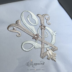 Interlocking V and L Embroidery Monogram Design, Sewout in cream and tan
