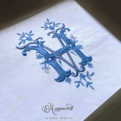 HV monogram embroidery floral sewout in several shades of blue