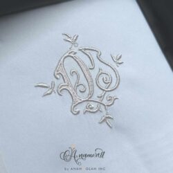 D and J Embroidery Monogram Design Monza, Sewout in one color on light grey fabric
