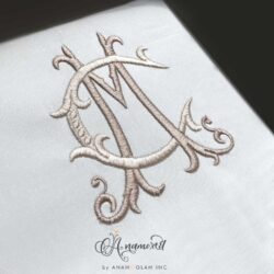 Interlocking C and M embroidery monogram design
