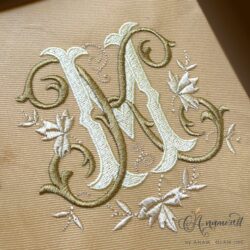 K and M interlocking embroidery monogram