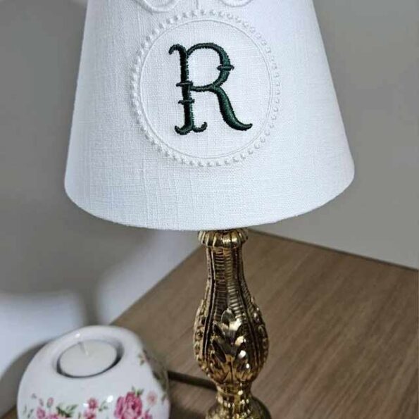 french fishtail on lamp shade in navy thread