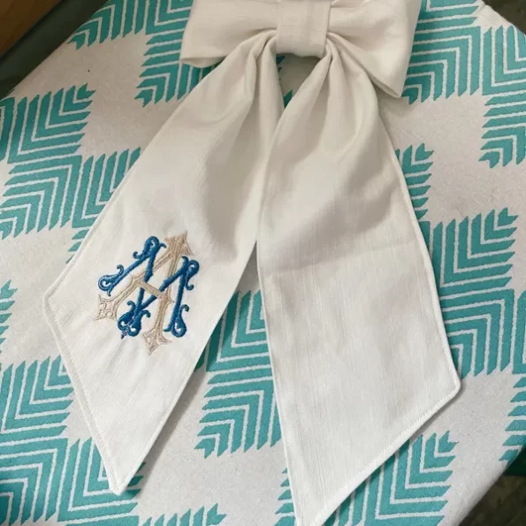 AM monogram on banner