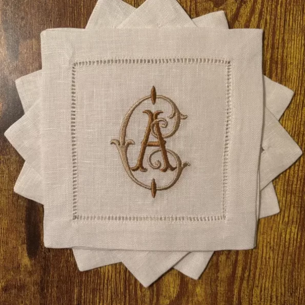 Interlocking C and A on cocktail napkins