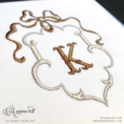 Vintage Bow and Crest Monogram Frame, Sewout with letter K in grey and brown thread