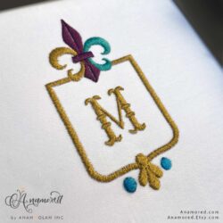 Crest Fleur Embroidery with M letter in center