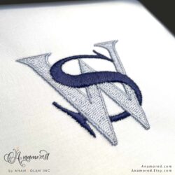 Interlocking Serif Embroidery Monogram Design, sewout in navy and light blue thread